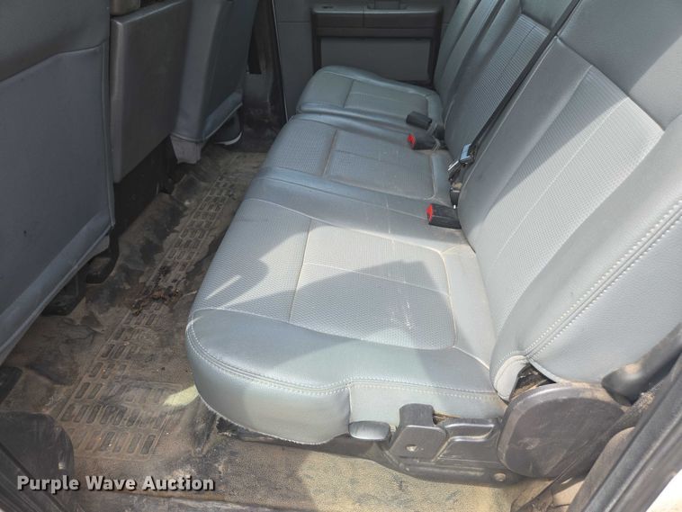 image for item DE2212 2016 Ford F350 Super Duty Crew Cab utility bed pickup truck