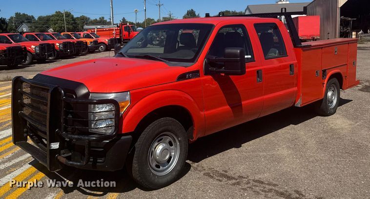 image for item ER2429 2011 Ford F250 Super Duty Crew Cab utility bed pickup truck