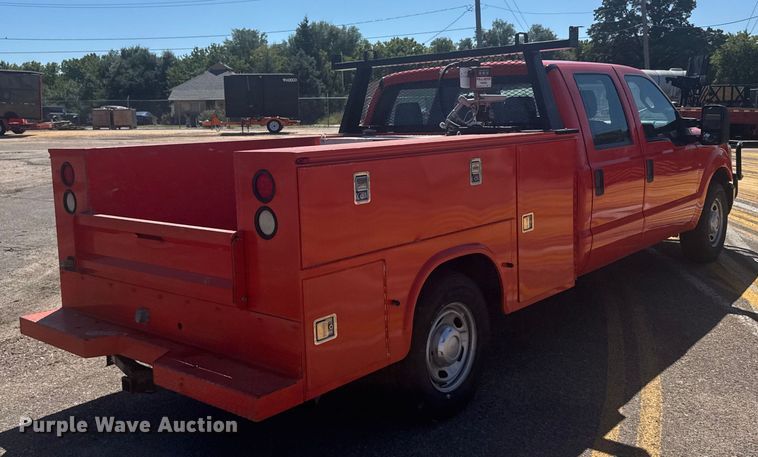 image for item ER2429 2011 Ford F250 Super Duty Crew Cab utility bed pickup truck