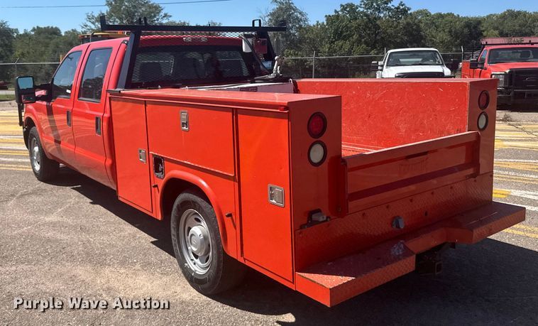 image for item ER2429 2011 Ford F250 Super Duty Crew Cab utility bed pickup truck