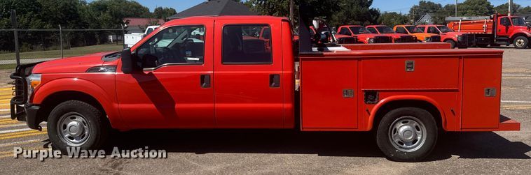 image for item ER2429 2011 Ford F250 Super Duty Crew Cab utility bed pickup truck