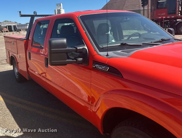 image for item ER2429 2011 Ford F250 Super Duty Crew Cab utility bed pickup truck