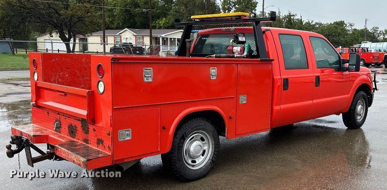 image for item ET4618 2011 Ford F250 Super Duty Crew Cab utility bed pickup truck