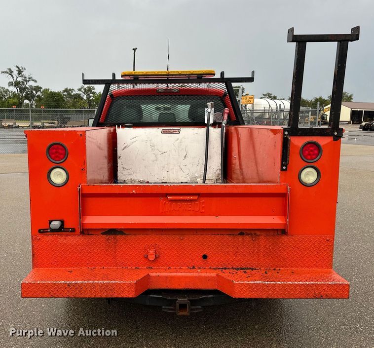 image for item ET4623 2011 Ford F250 Super Duty Crew Cab utility bed pickup truck