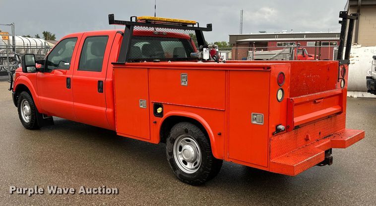 image for item ET4623 2011 Ford F250 Super Duty Crew Cab utility bed pickup truck