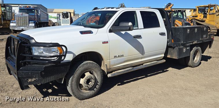 image for item DY1240 2019 RAM 3500HD Crew Cab flatbed pickup truck