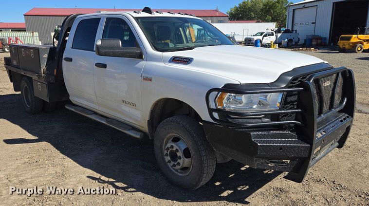 image for item DY1240 2019 RAM 3500HD Crew Cab flatbed pickup truck