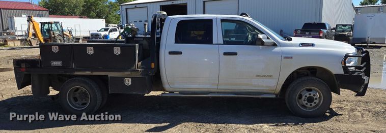 image for item DY1240 2019 RAM 3500HD Crew Cab flatbed pickup truck