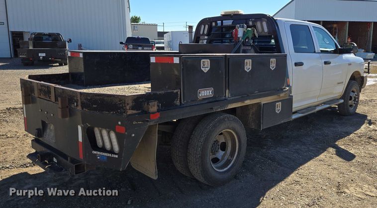 image for item DY1240 2019 RAM 3500HD Crew Cab flatbed pickup truck