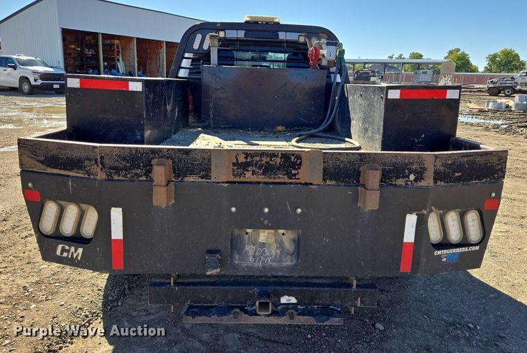 image for item DY1240 2019 RAM 3500HD Crew Cab flatbed pickup truck