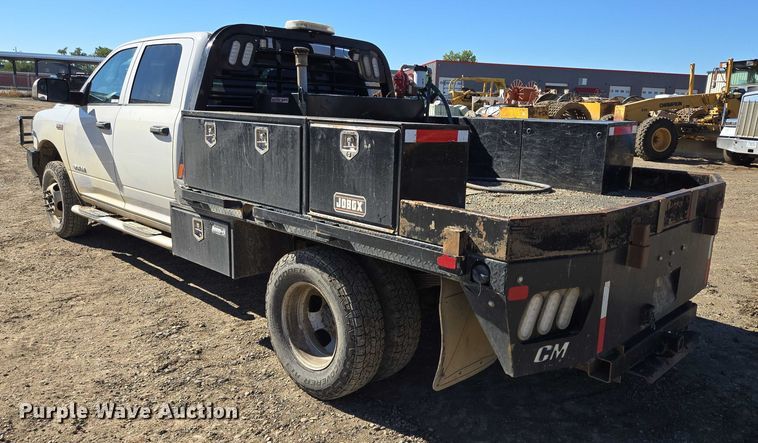 image for item DY1240 2019 RAM 3500HD Crew Cab flatbed pickup truck