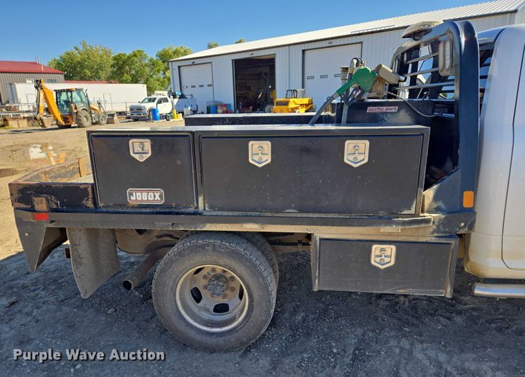 image for item DY1240 2019 RAM 3500HD Crew Cab flatbed pickup truck