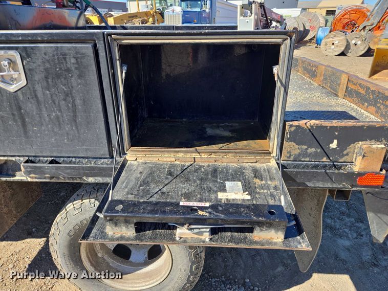 image for item DY1240 2019 RAM 3500HD Crew Cab flatbed pickup truck