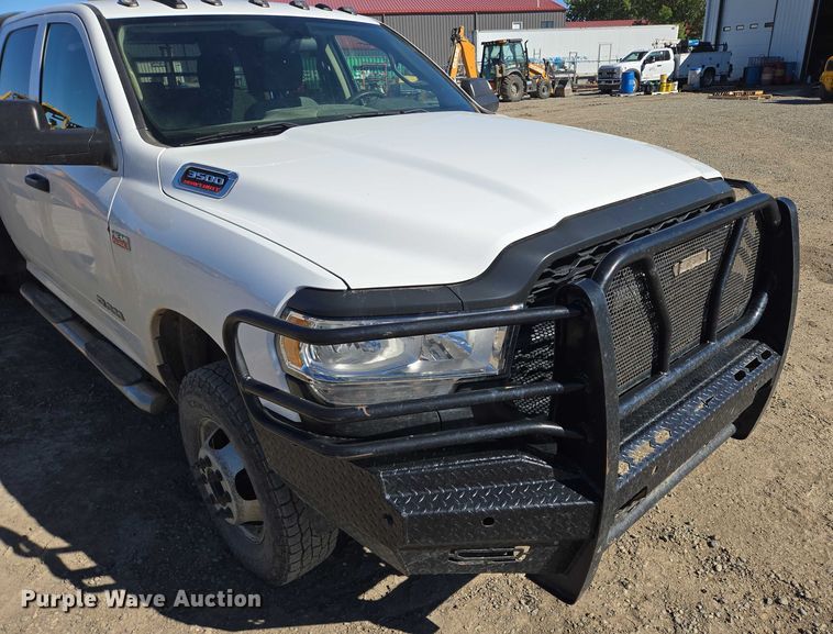 image for item DY1240 2019 RAM 3500HD Crew Cab flatbed pickup truck