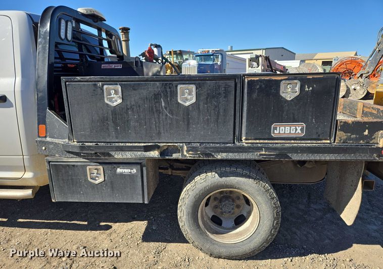 image for item DY1240 2019 RAM 3500HD Crew Cab flatbed pickup truck