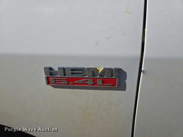 image for item DY1240 2019 RAM 3500HD Crew Cab flatbed pickup truck