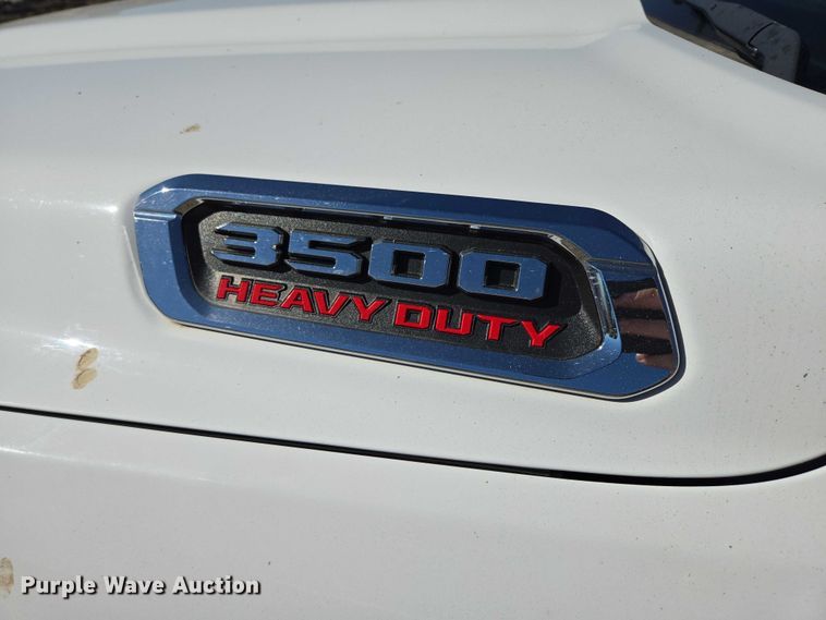 image for item DY1240 2019 RAM 3500HD Crew Cab flatbed pickup truck