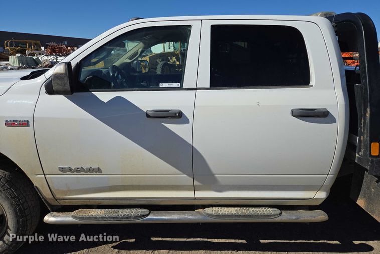 image for item DY1240 2019 RAM 3500HD Crew Cab flatbed pickup truck