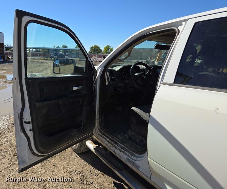 image for item DY1240 2019 RAM 3500HD Crew Cab flatbed pickup truck