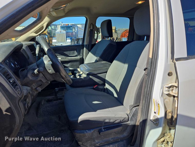 image for item DY1240 2019 RAM 3500HD Crew Cab flatbed pickup truck