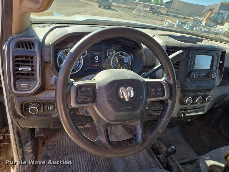 image for item DY1240 2019 RAM 3500HD Crew Cab flatbed pickup truck