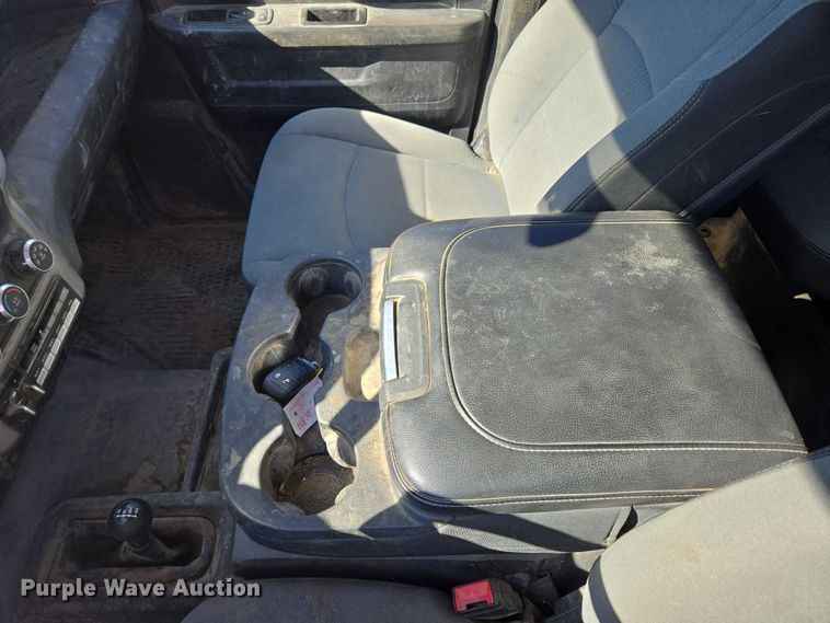 image for item DY1240 2019 RAM 3500HD Crew Cab flatbed pickup truck