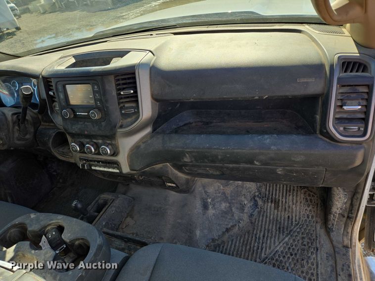 image for item DY1240 2019 RAM 3500HD Crew Cab flatbed pickup truck