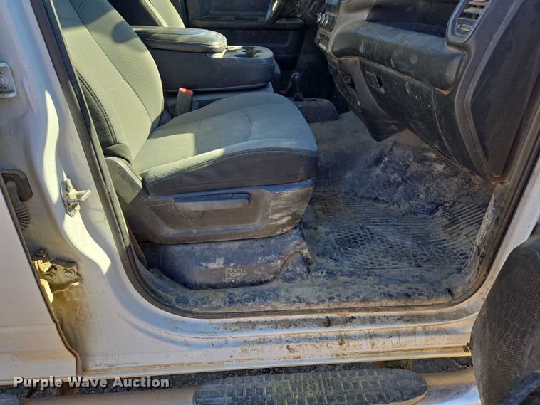 image for item DY1240 2019 RAM 3500HD Crew Cab flatbed pickup truck