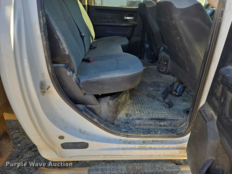 image for item DY1240 2019 RAM 3500HD Crew Cab flatbed pickup truck