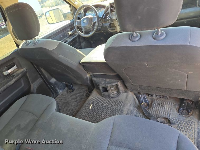 image for item DY1240 2019 RAM 3500HD Crew Cab flatbed pickup truck