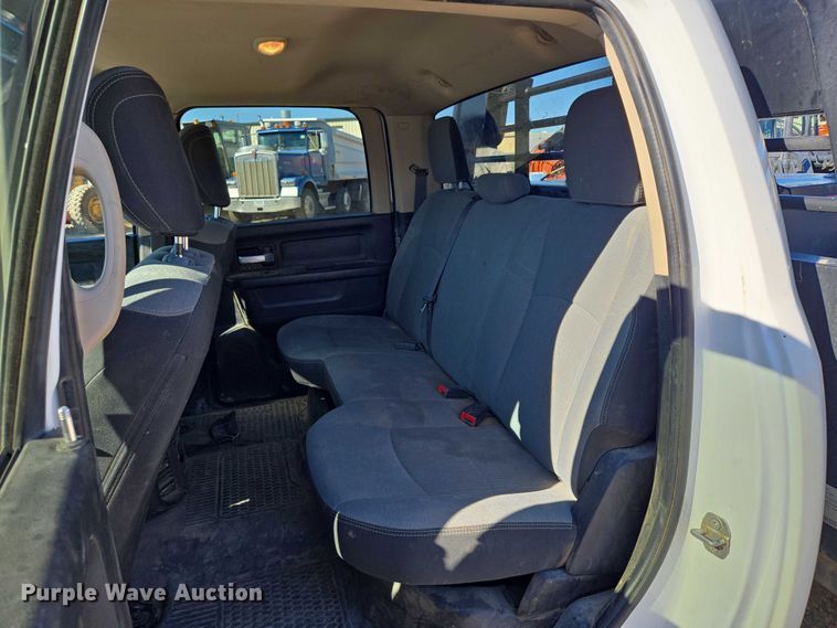 image for item DY1240 2019 RAM 3500HD Crew Cab flatbed pickup truck