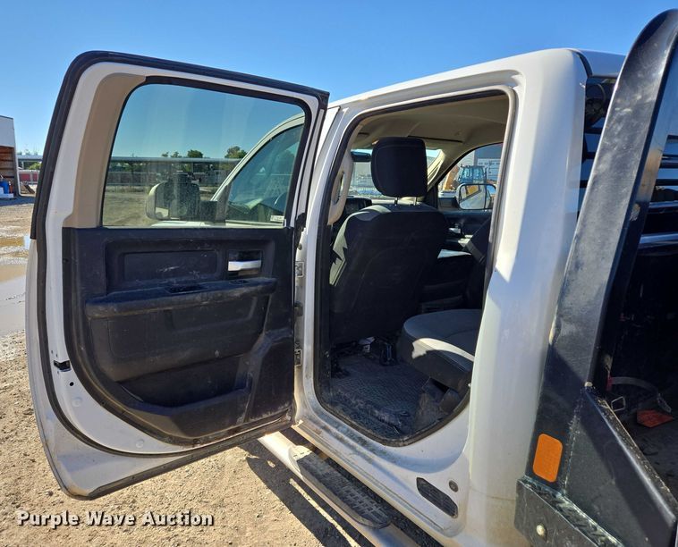 image for item DY1240 2019 RAM 3500HD Crew Cab flatbed pickup truck