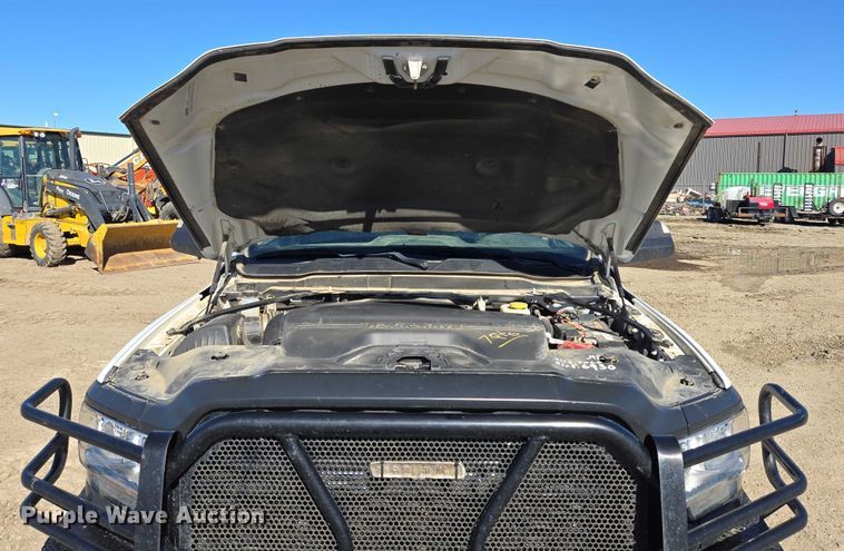 image for item DY1240 2019 RAM 3500HD Crew Cab flatbed pickup truck