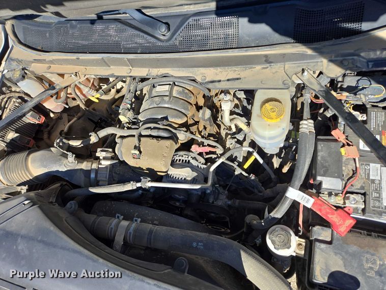 image for item DY1240 2019 RAM 3500HD Crew Cab flatbed pickup truck