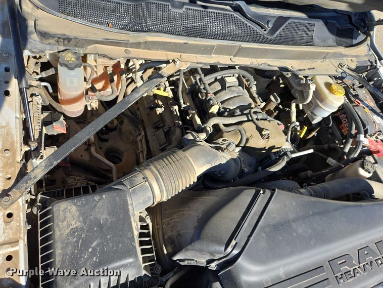 image for item DY1240 2019 RAM 3500HD Crew Cab flatbed pickup truck