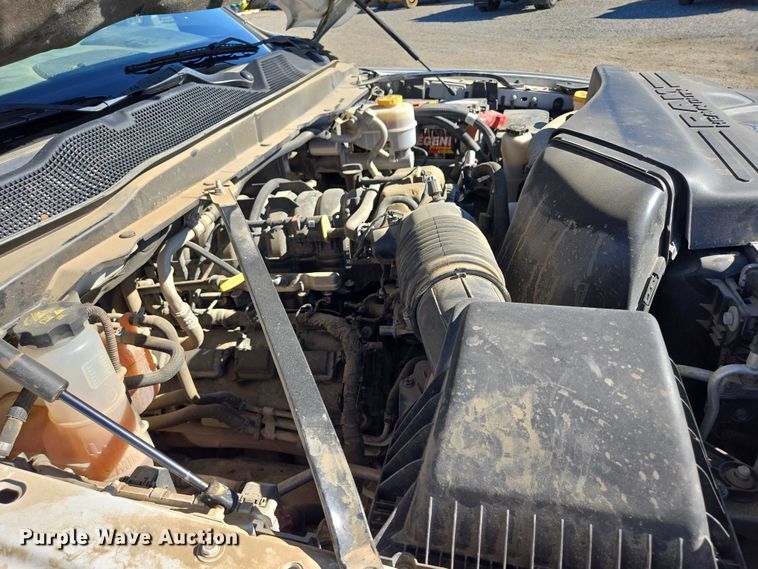 image for item DY1240 2019 RAM 3500HD Crew Cab flatbed pickup truck