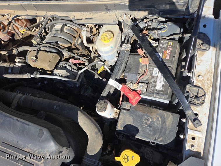 image for item DY1240 2019 RAM 3500HD Crew Cab flatbed pickup truck