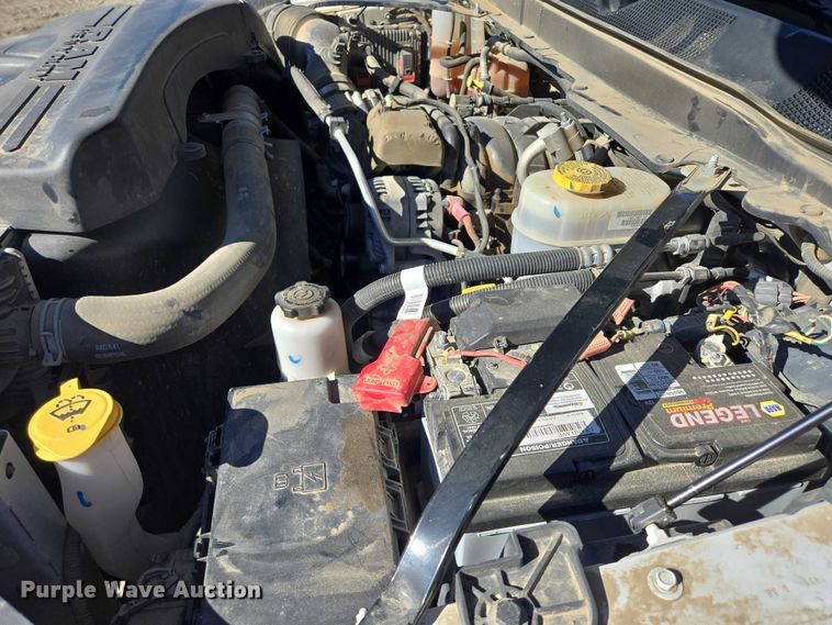 image for item DY1240 2019 RAM 3500HD Crew Cab flatbed pickup truck