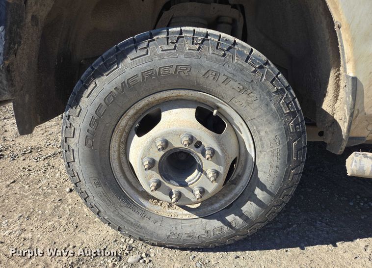 image for item DY1240 2019 RAM 3500HD Crew Cab flatbed pickup truck