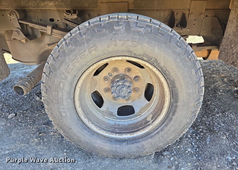 image for item DY1240 2019 RAM 3500HD Crew Cab flatbed pickup truck