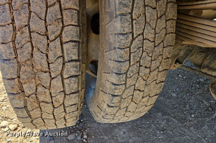 image for item DY1240 2019 RAM 3500HD Crew Cab flatbed pickup truck