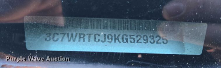 image for item DY1240 2019 RAM 3500HD Crew Cab flatbed pickup truck