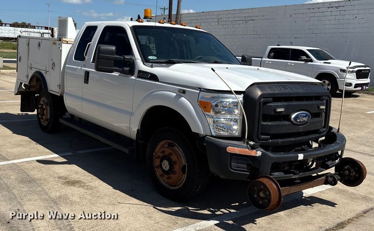 image for item EA7539 2012 Ford F350 Super Duty SuperCab utility bed pickup truck