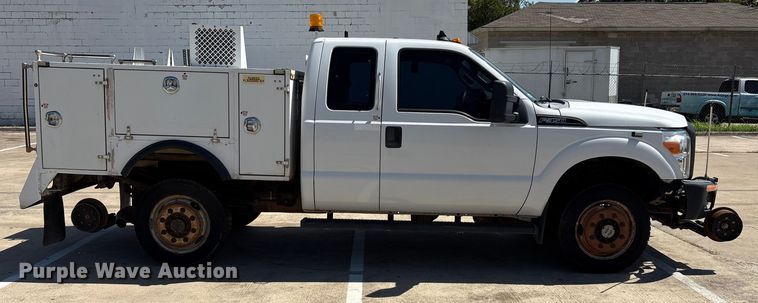 image for item EA7539 2012 Ford F350 Super Duty SuperCab utility bed pickup truck