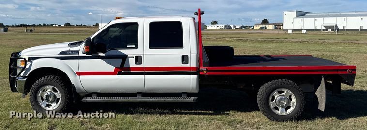 image for item ER2467 2011 Ford F350 Super Duty  Crew Cab flatbed pickup truck