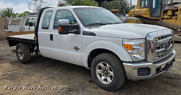 image for item EU2529 2016 Ford F250 Super Duty SuperCab flatbed pickup truck
