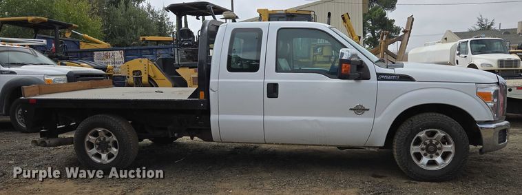 image for item EU2529 2016 Ford F250 Super Duty SuperCab flatbed pickup truck