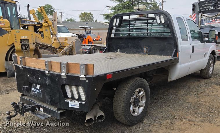 image for item EU2529 2016 Ford F250 Super Duty SuperCab flatbed pickup truck
