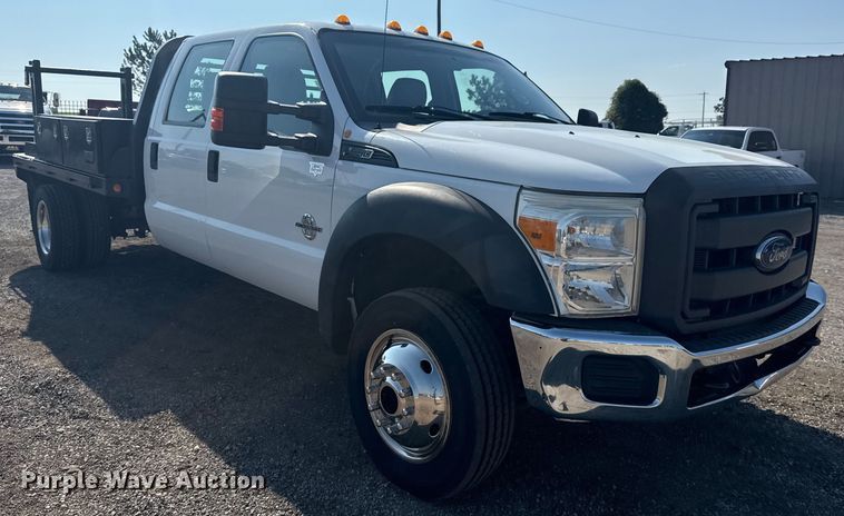 image for item NU9623 2015 Ford F550 Super Duty Crew Cab flatbed truck