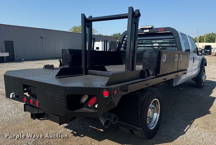 image for item NU9623 2015 Ford F550 Super Duty Crew Cab flatbed truck